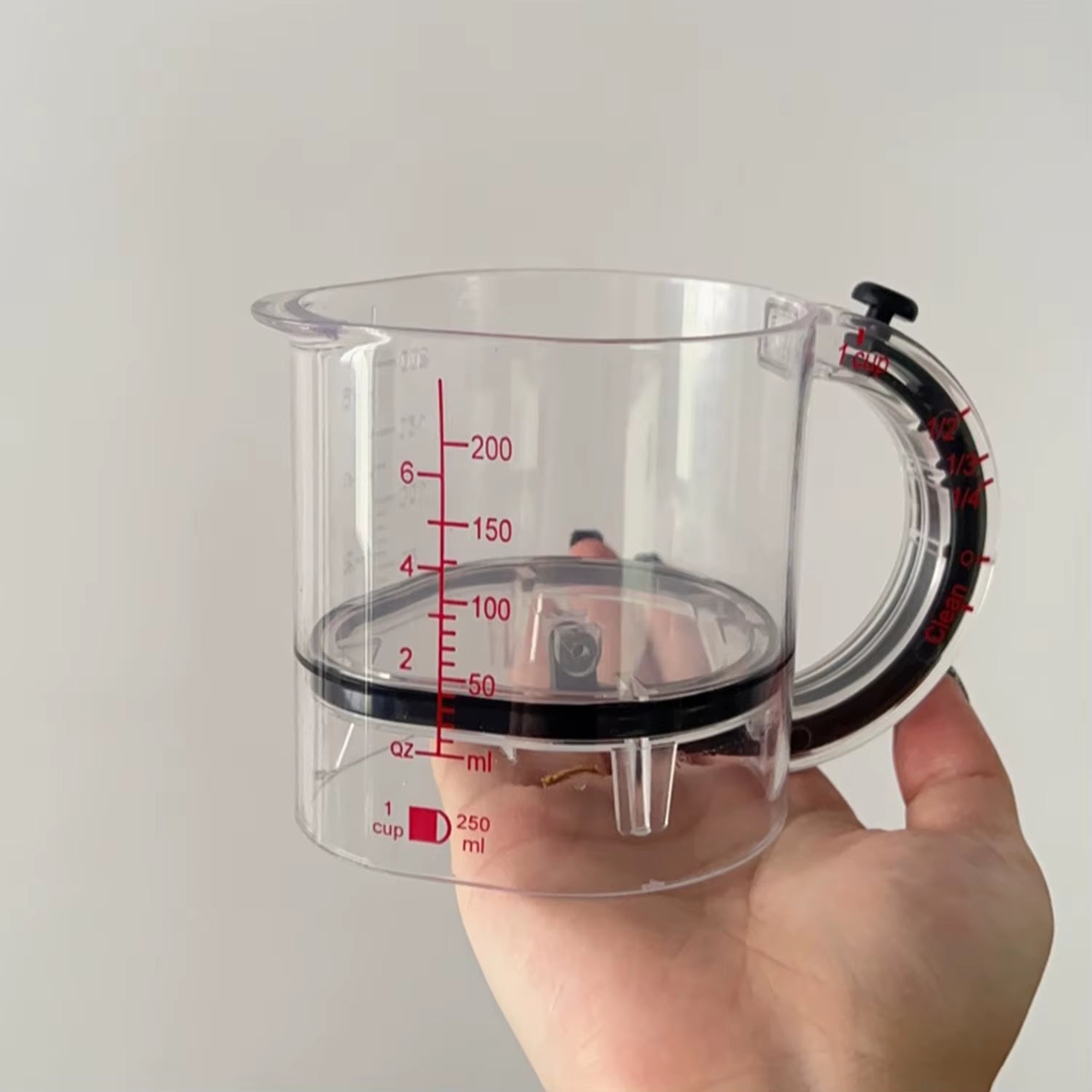 4-IN-1 Measuring Cup with Scraper-Style Base